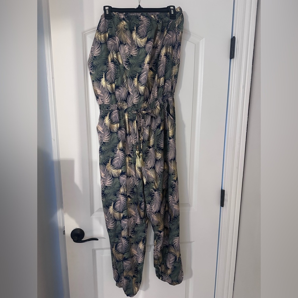New. Never worn jumpsuit/coverup